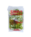 Packaged gourmet salad mix with visible brand name on a white background