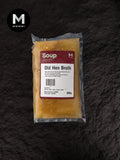 Mmmm! Old Hen Broth, 500g pack, on a black background