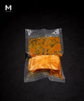 Vacuum-packed Spanish Swordfish fillet marinated in savoury miso blend, on black background