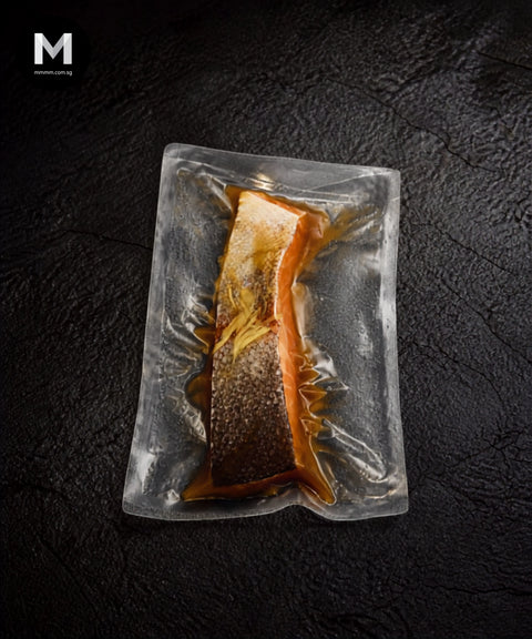 Australian Trout fillet marinated in Umami Dashi, skin side with fresh ginger garnish