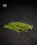 Thai baby/pencil asparagus spears on a black background