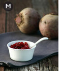 Cooked Baby Beetroots, whole and diced, in a small bowl