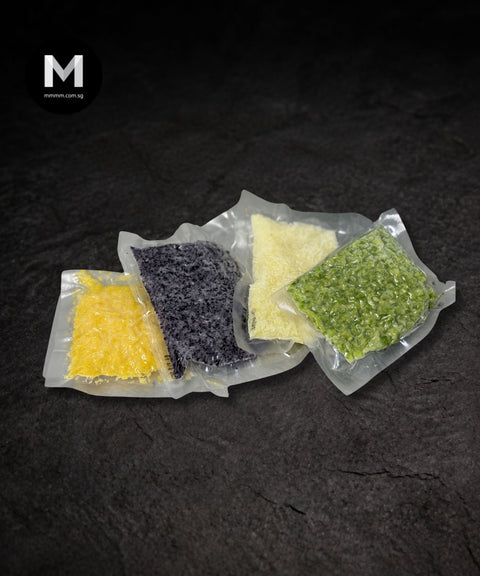 Sealed cauliflower rice pouches on a black background