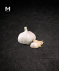 Whole and peeled China garlic bulbs on a black background