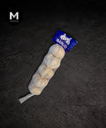 China garlic bulbs packed in a bag on a black background
