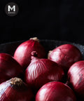 Spanish Red Onions in a bowl, close-up