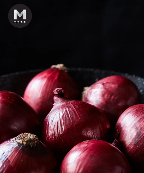 Spanish Red Onions in a bowl, close-up