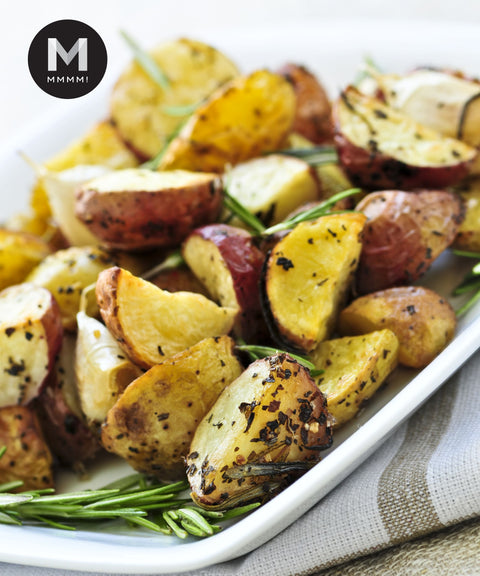 Roasted red skin potatoes served on a plate