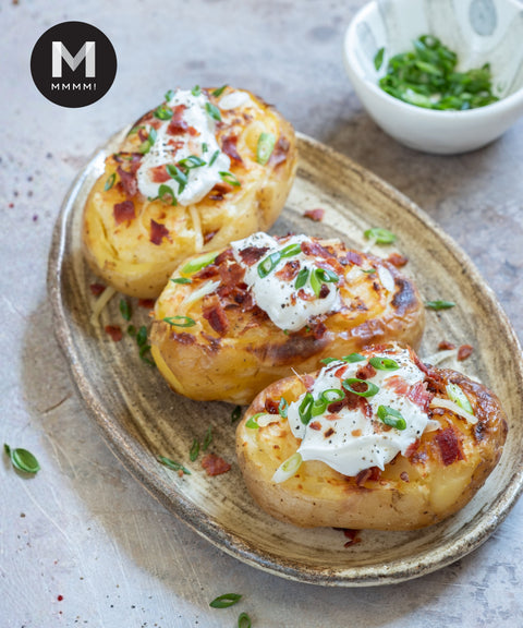 Twice-baked russet potato served on a plate