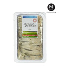 Packaged marinated anchovies with a label on a white background